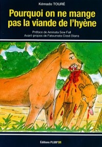 une lionne qui dévore une hyène