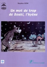 L’image est encadrée en violet : sous un ciel étoilé, un loup de dos regarde, affamé, un chameau en train de manger le feuillage des arbres. 