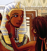 une jeune femme maquille le pharaon