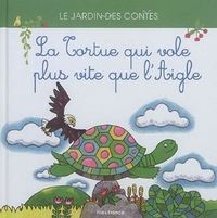 Une tortue qui vole à côté d'un aigle.