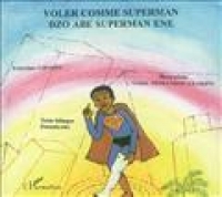 enfant habillé en Superman, sur fond jaune, rose et vert