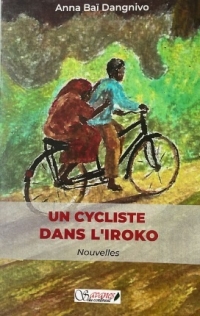 Un cycliste dans l'iroko Un vélo dans un paysage verdoyant