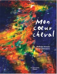 Couverture de : Mon cœur cheval قلبي الحصان La silhouette en couleurs d'un cheval, couleurs vives, fond bleu nuit.